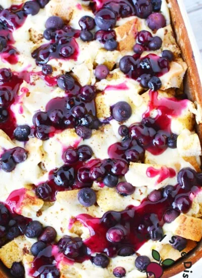 blueberry french toast casserole with blueberry sauce.