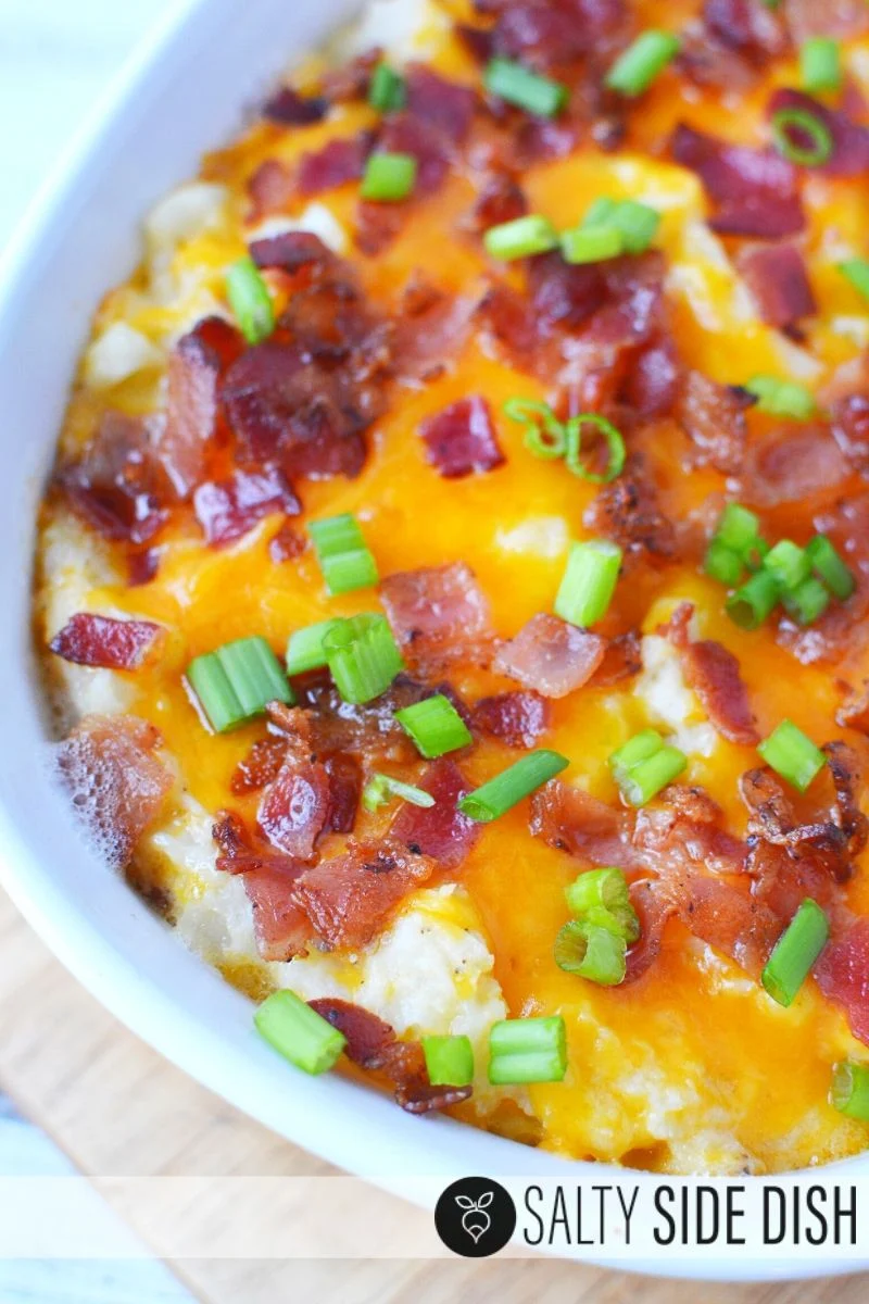 Cooked and ready to serve twice baked potato casserole with cheese, bacon, and green onions