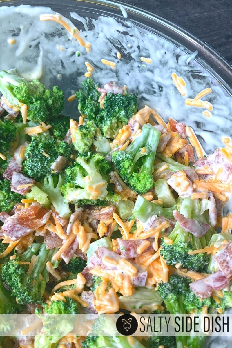 assemble broccoli salad with dressing, bacon, cheese and broccoli