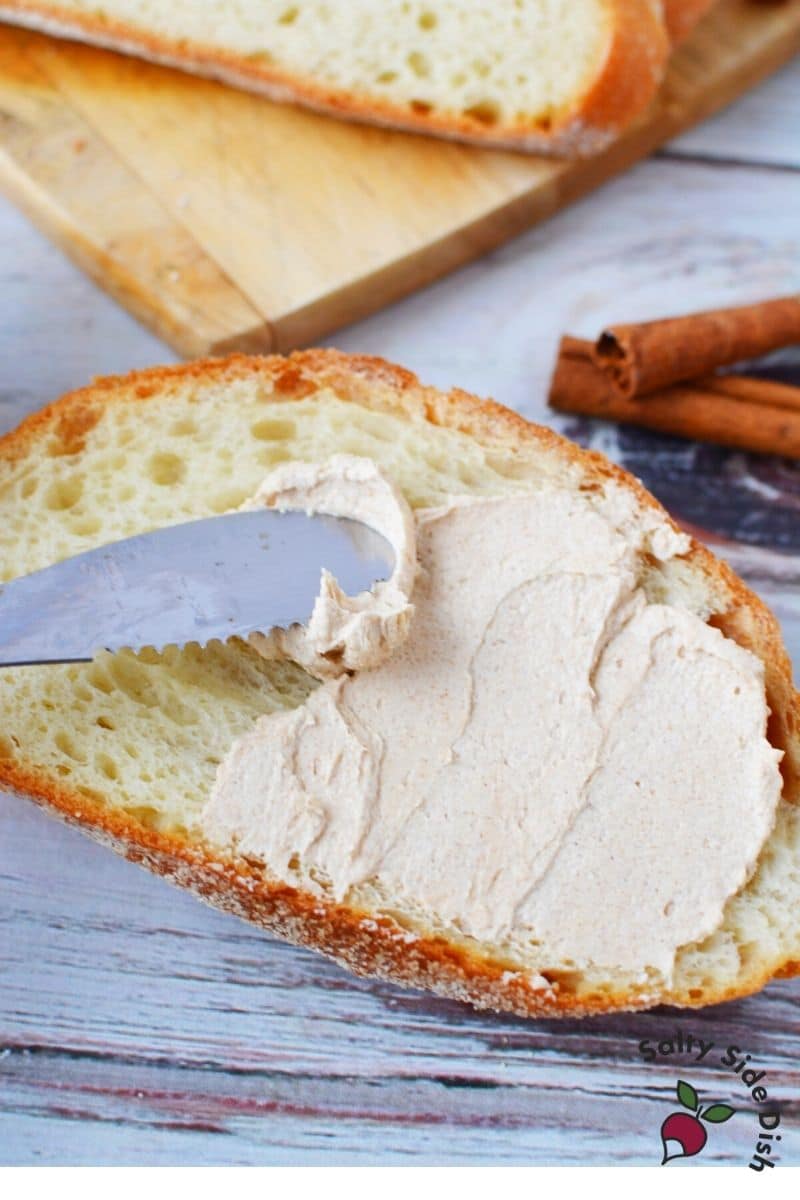 spread sugar butter on a piece of delicious toast for a real treat