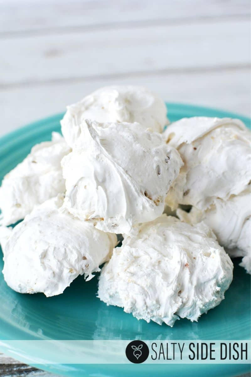 divinity candy are perfect tiny sugary clouds of vanilla and bits of pecan rolled into a light meringue style dessert treat