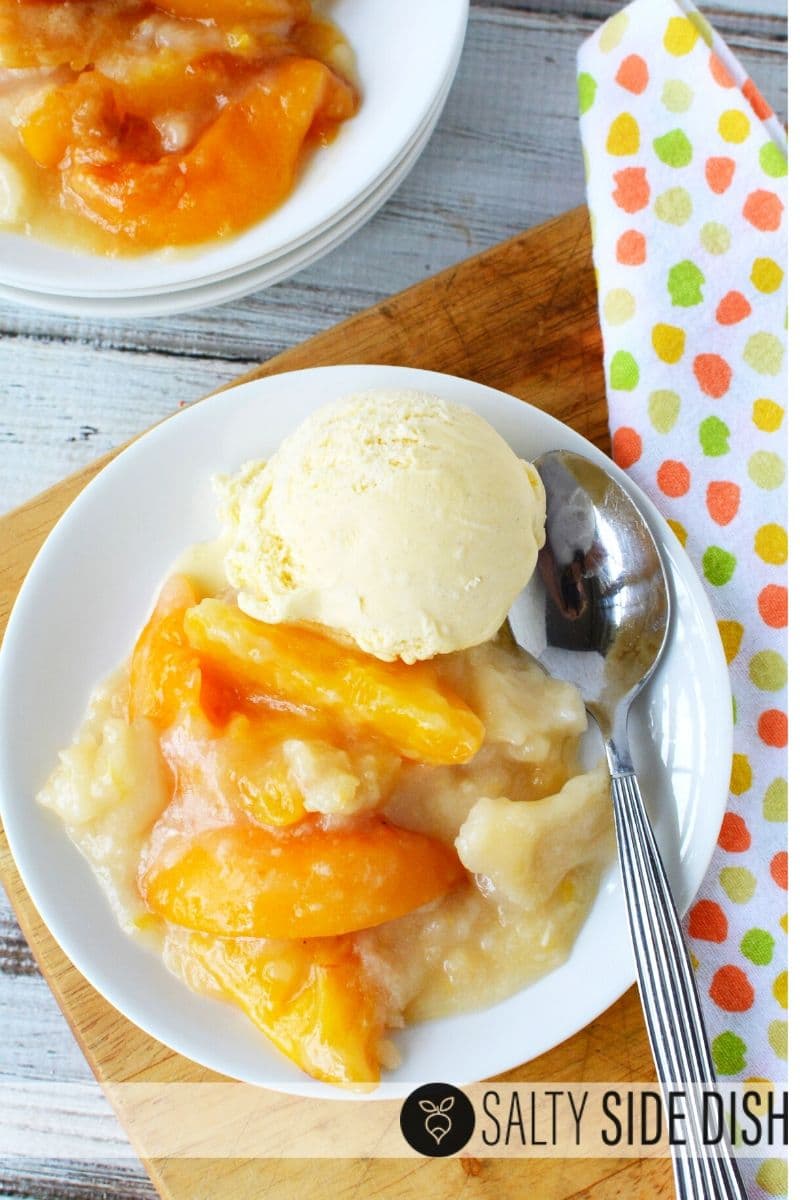 Serving two plates of dump cake but enough for a crowd with topping and ice cream, simple easy smooth mouthwatering dessert