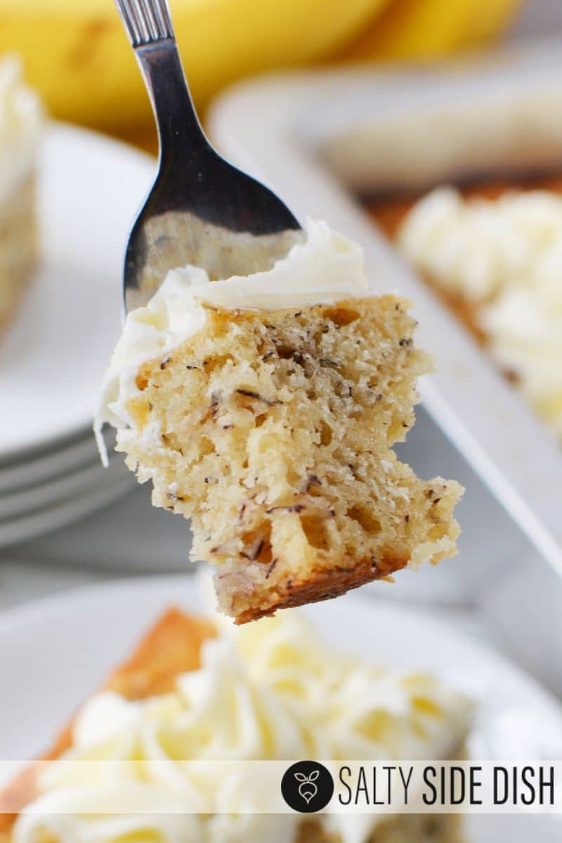 bite of delicious banana bars better than even banana bread sitting on a fork and ready to eat