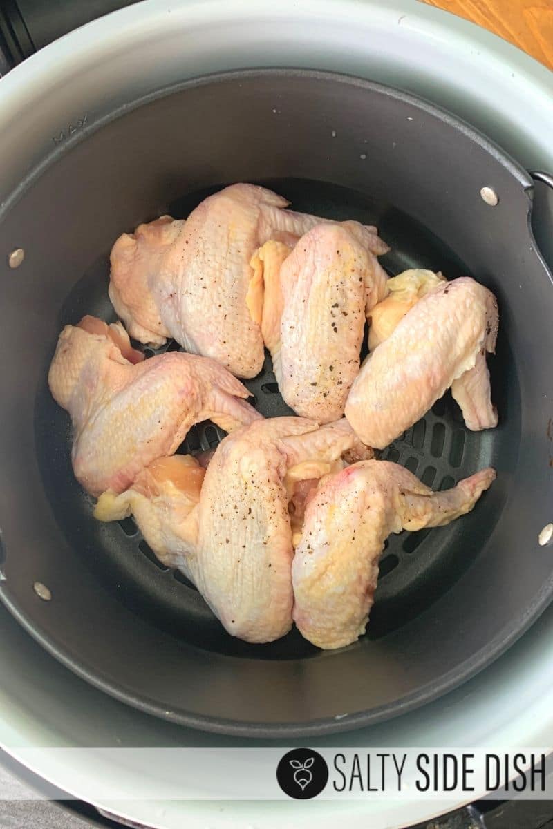 add chicken wings raw in the air crisper basket