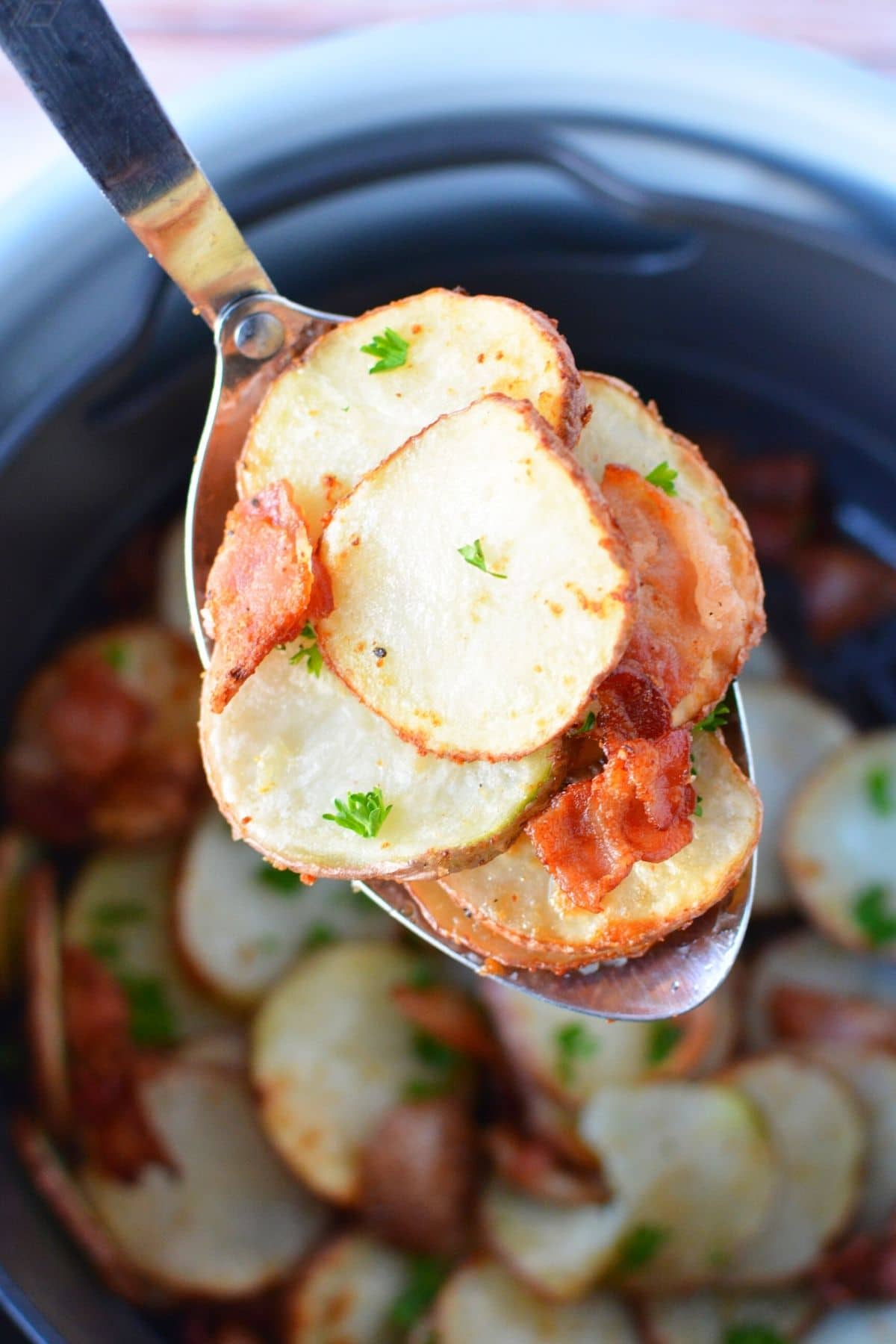 roasted potatoes on a spoon