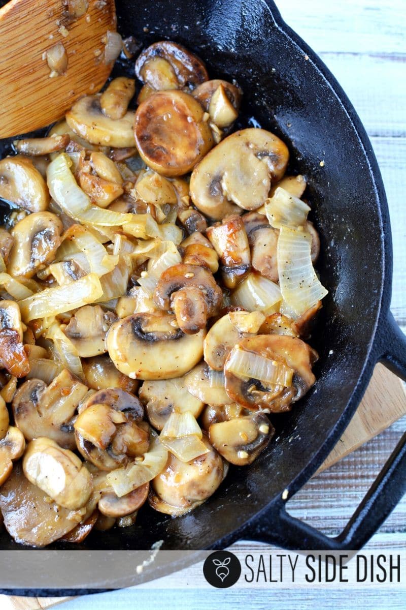simple 10 minute side dish in a cast iron pan and on your oven with sauteed onions and mushrooms