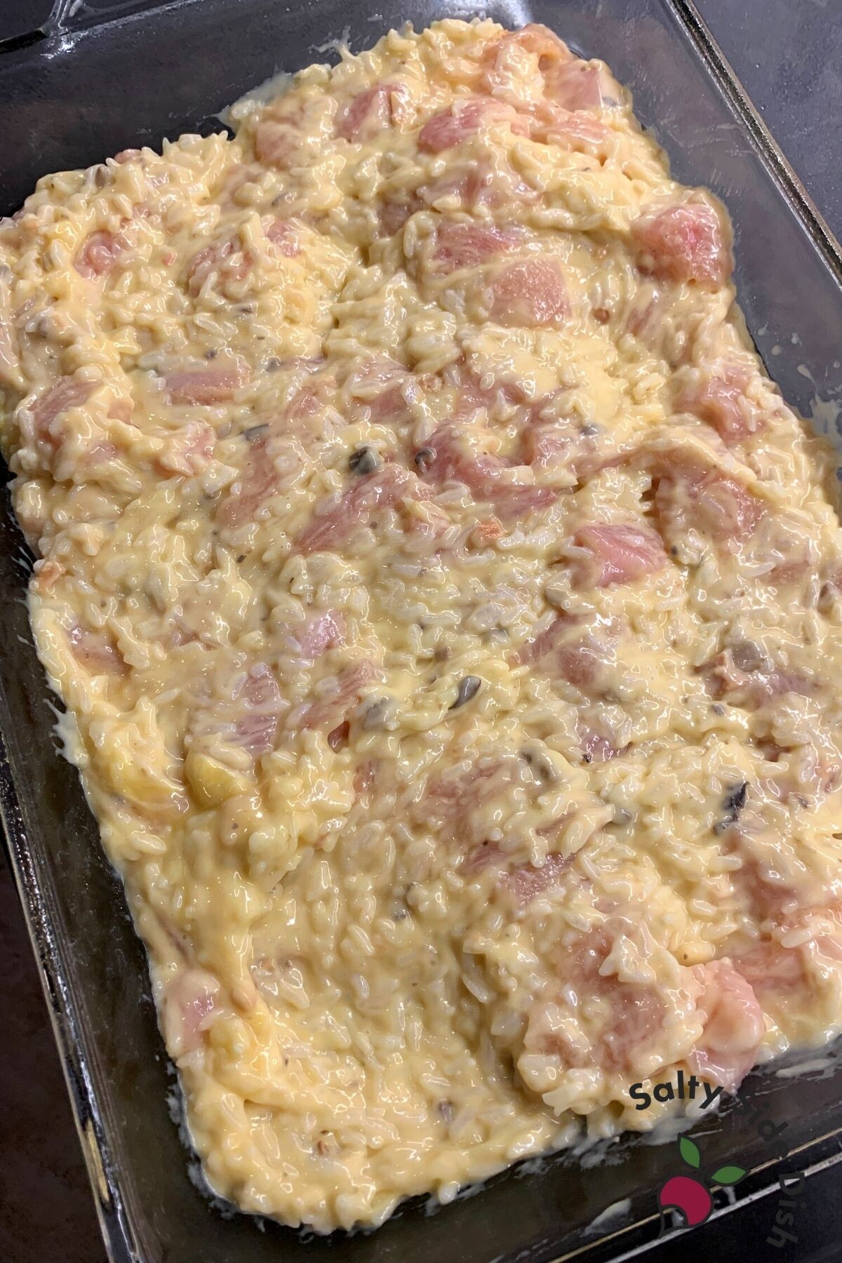 pre-cooked chicken and rice in a casserole dish.