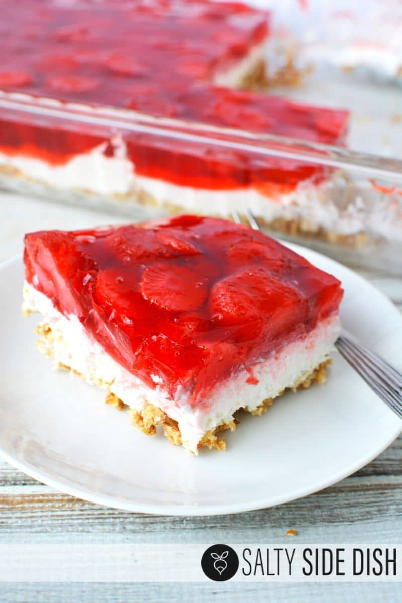 strawberry pretzel salad on a plate.