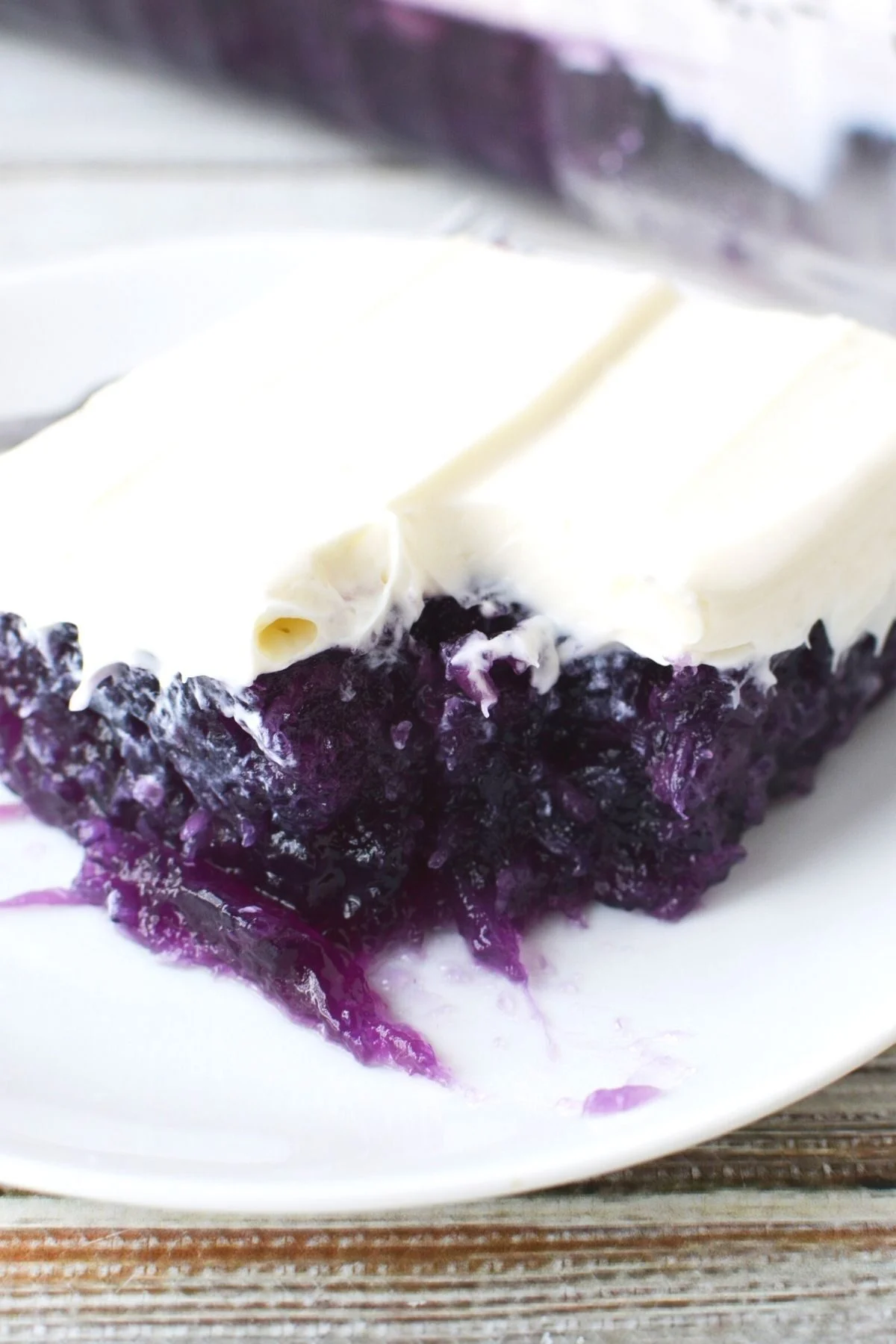 white plate with blueberry salad on it.