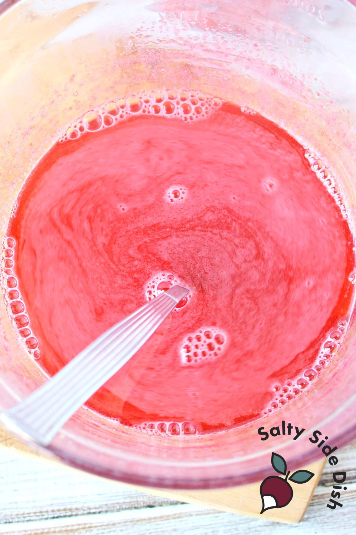 mixing jello in a bowl