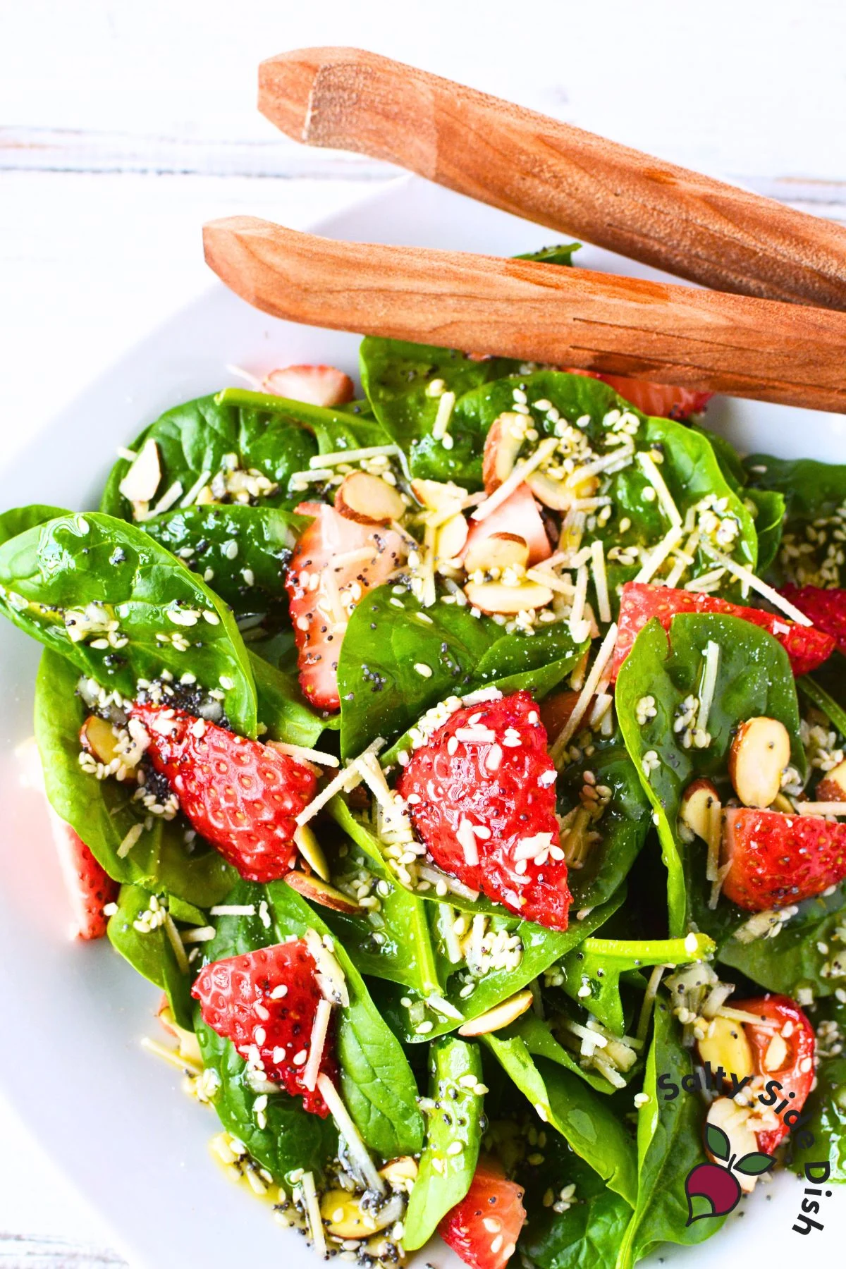 spinach leaves with strawberries.