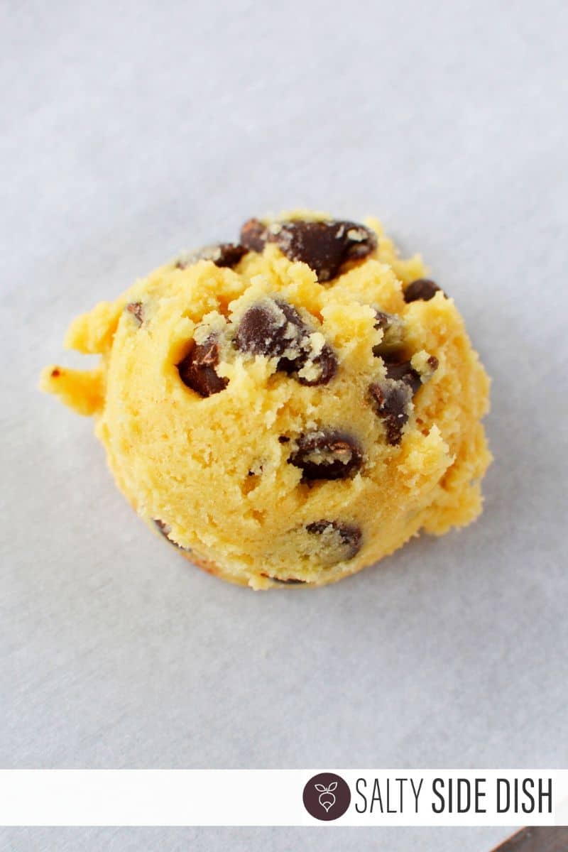 Portion out chocolate chip cookie dough using a tablespoon scoop