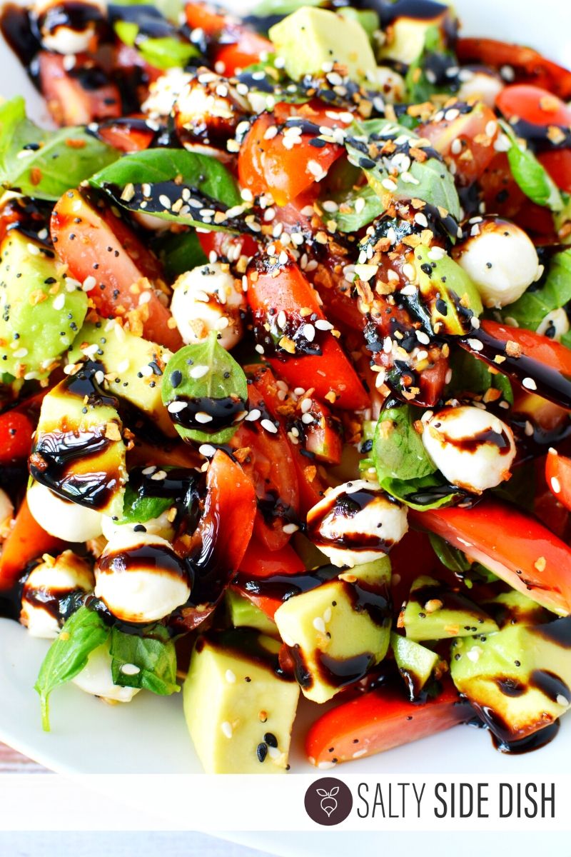 Caprese Everything Bagel Avocado Salad Recipe already done and on a plate ready to serve up as a side salad