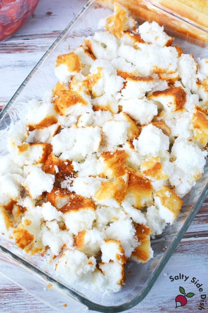 bite sized bits of angel food cake torn and on a plate