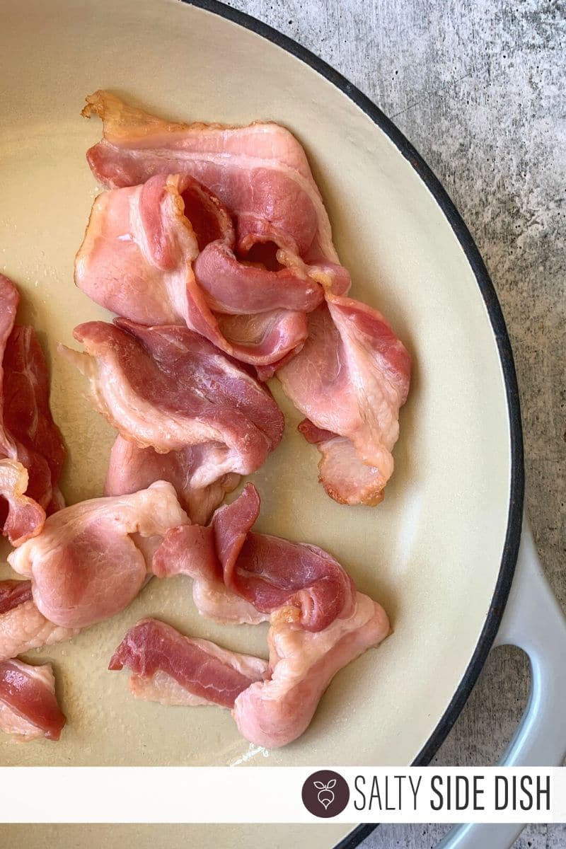 bacon in pan being cooked