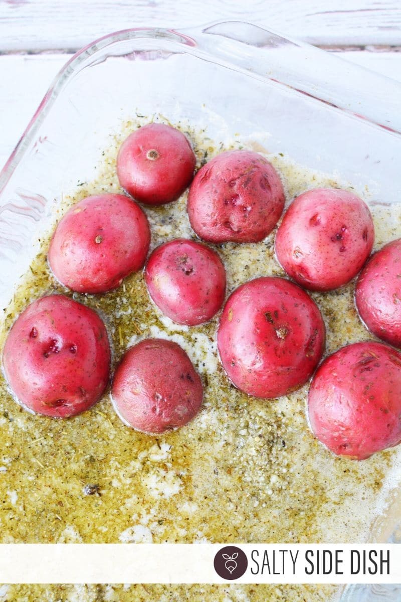 melted herb potatoes in butter and seasoning baked in oven
