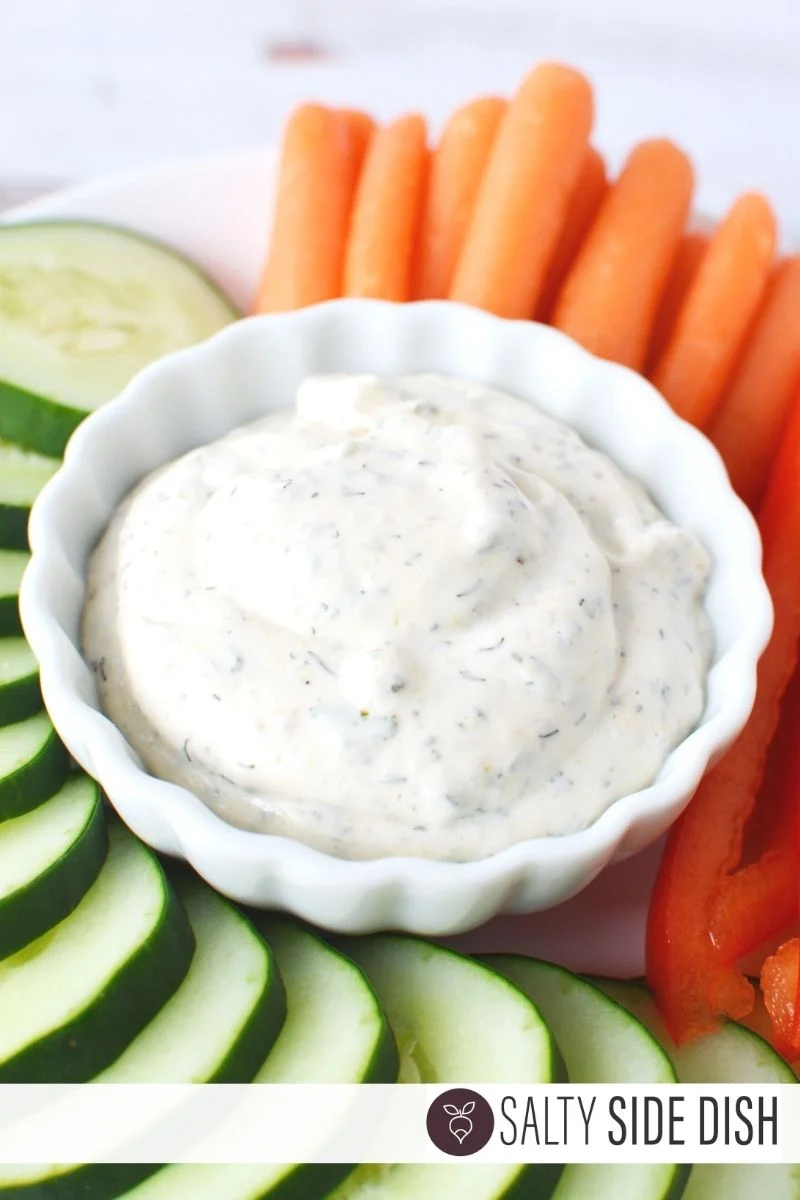 Ranch Dip on plate ready to serve with a vegetable tray