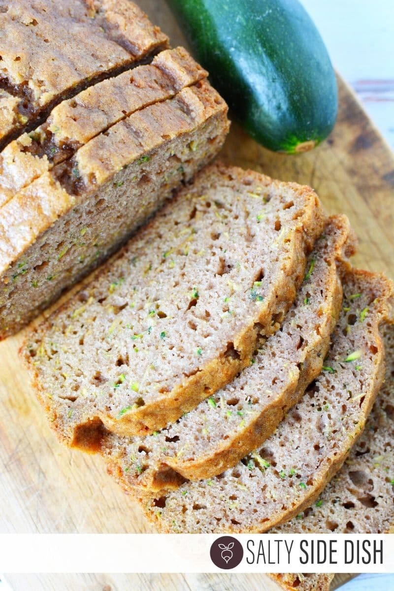 Super Moist Zucchini Bread recipe sliced on a counter