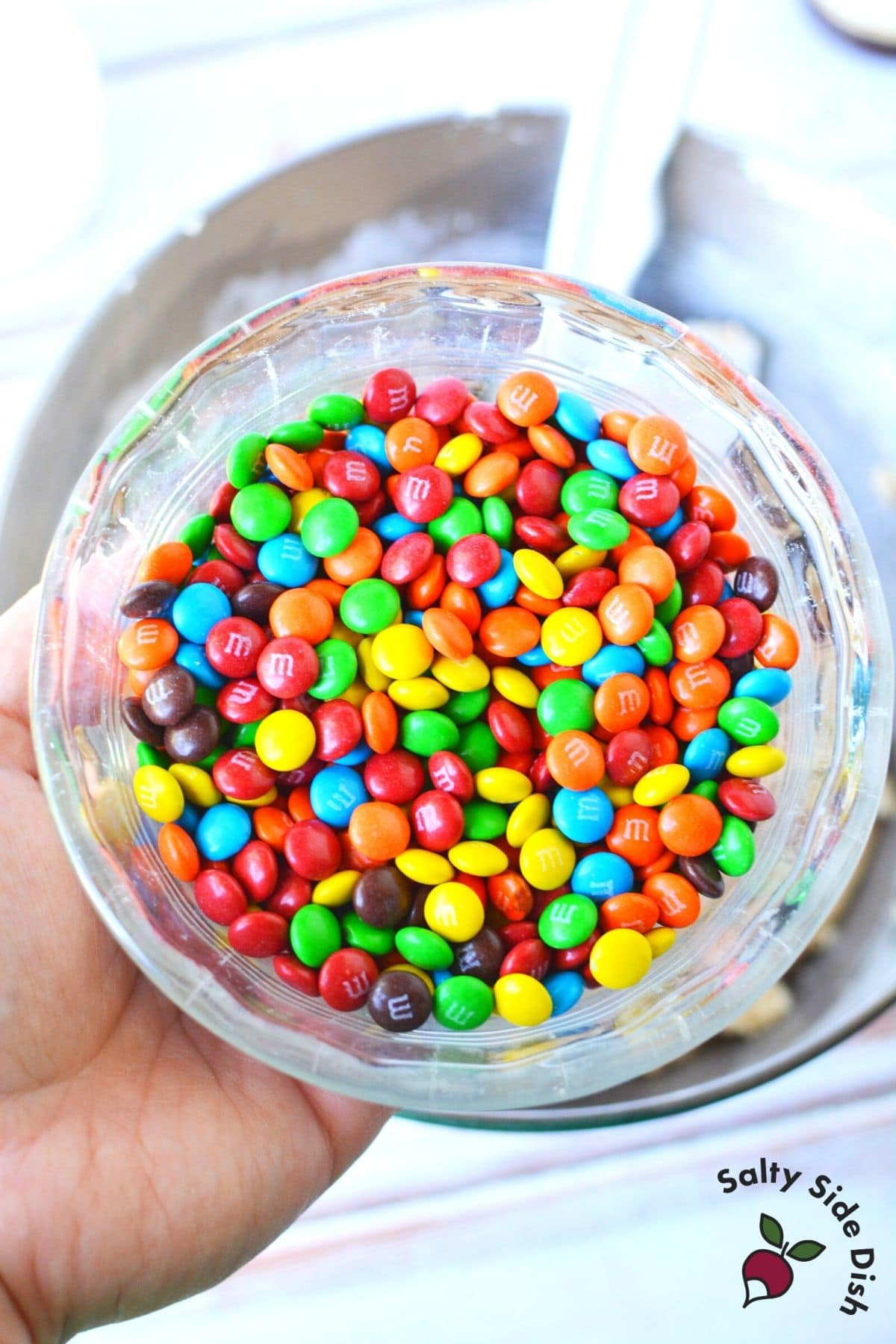 mini M&M candies in a glass bowl