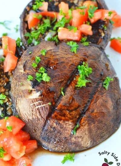 grilled portobello mushroom cap with tomatoes and fresh parsley