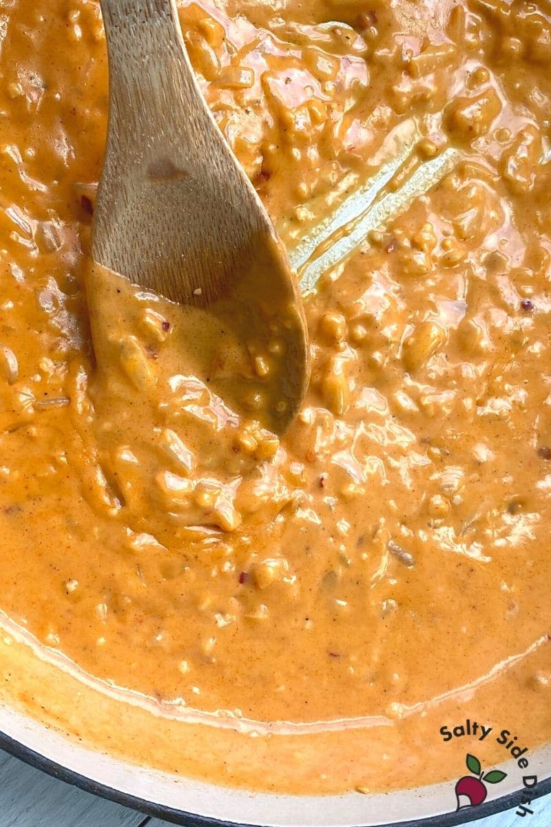Heat pasta sauce for about 2-3 minutes, stirring constantly, taking care not to burn on the bottom - you may need to lower your pan heat if you detect that its too high.