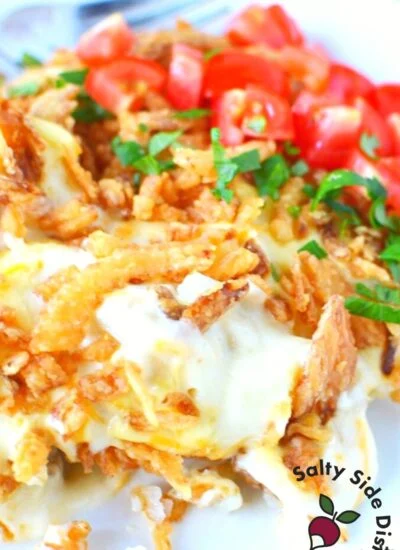 an easy tater tot casserole piled high with toppings.