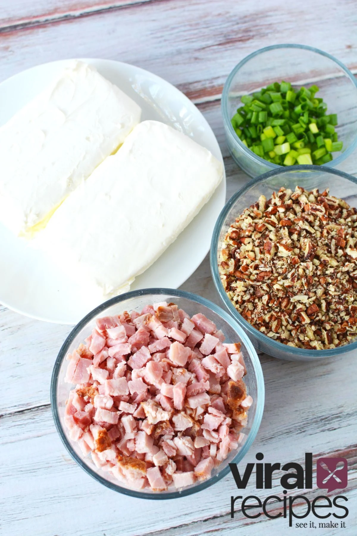 cheeseball ingredients with ham, cream cheese, and green onions.