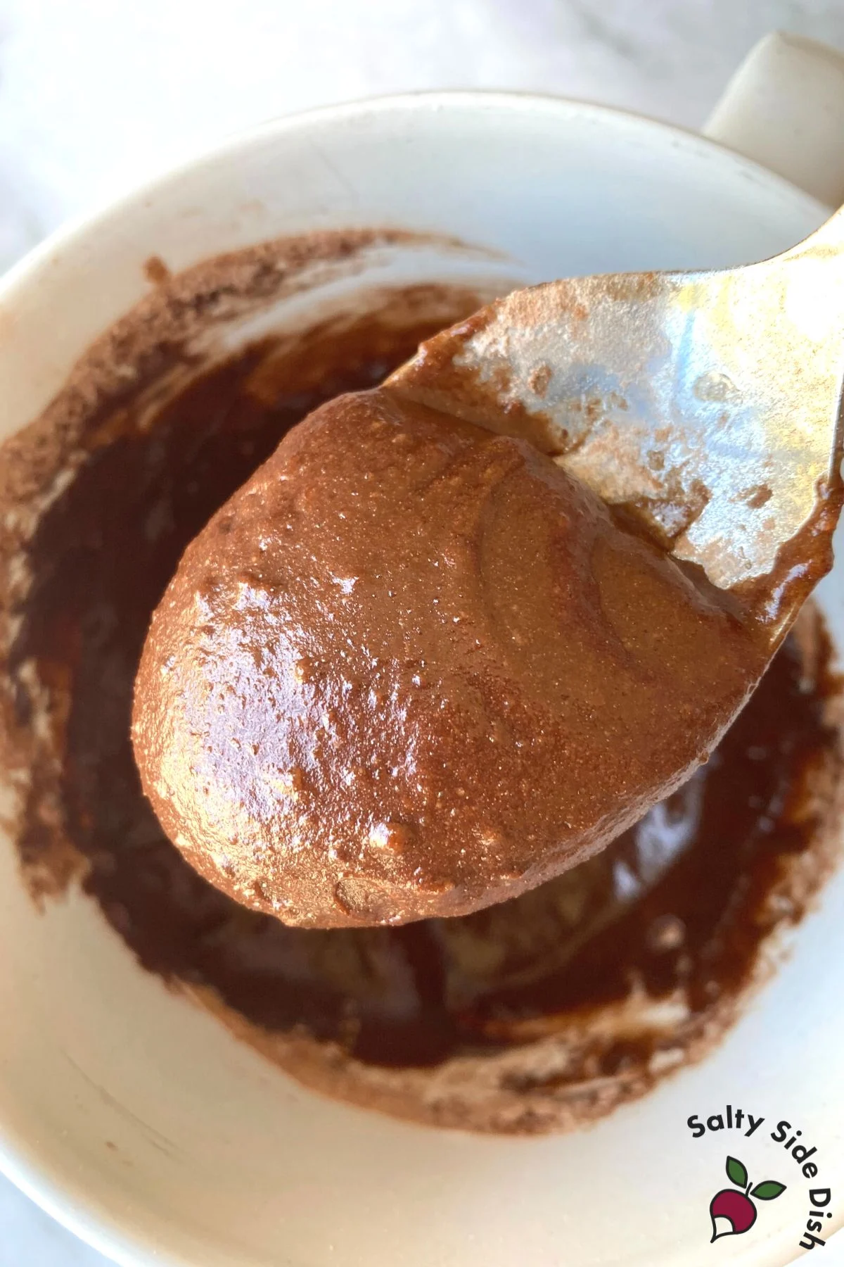 stir together mug cake batter.