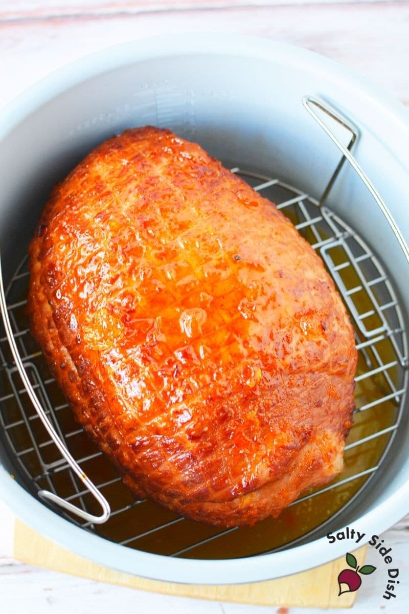 Spoon glaze on top of the ham and using the Air Fryer lid, set the Foodi to Air Crisp for 8 minutes.