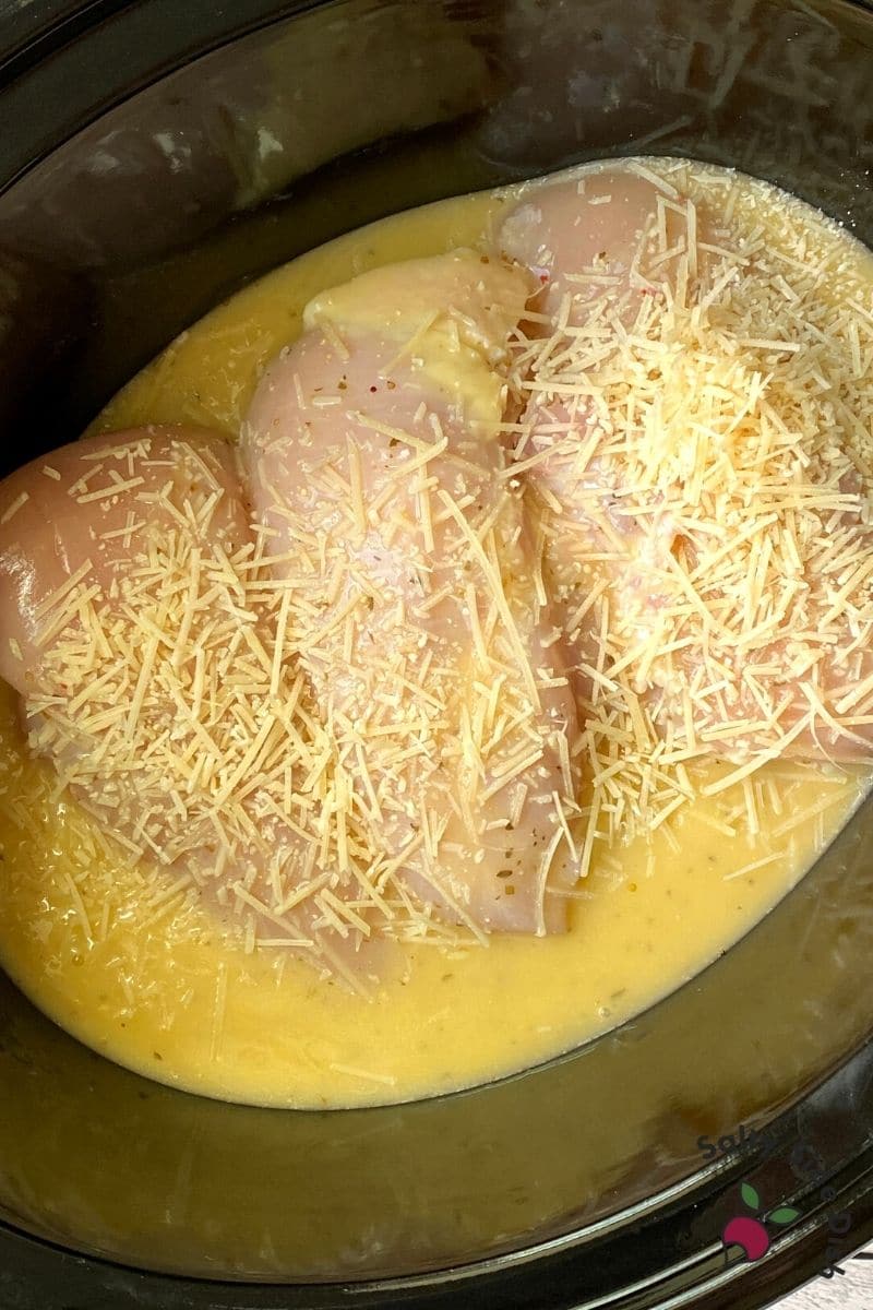 Shredded Parmesan Cheese over slow cooker olive garden chicken
