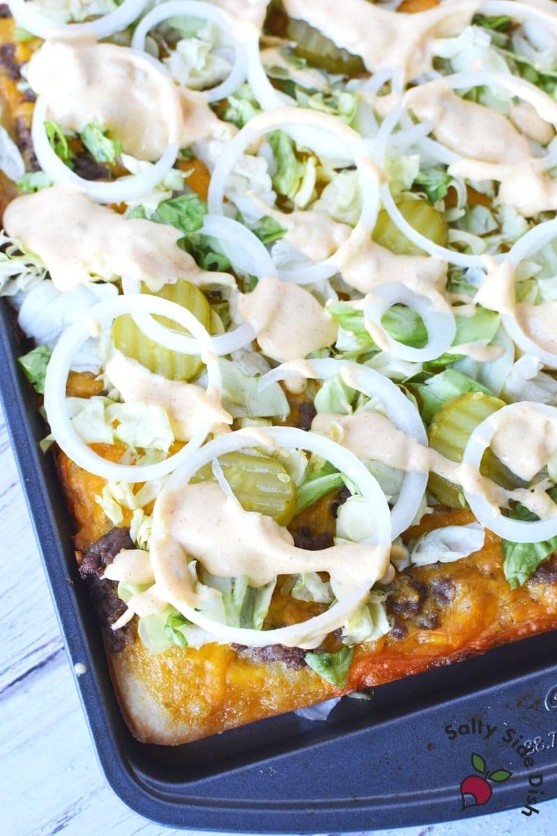 Baked on a sheet pan or pizza stone, big mac pizza copycat recipe right out of the Oven