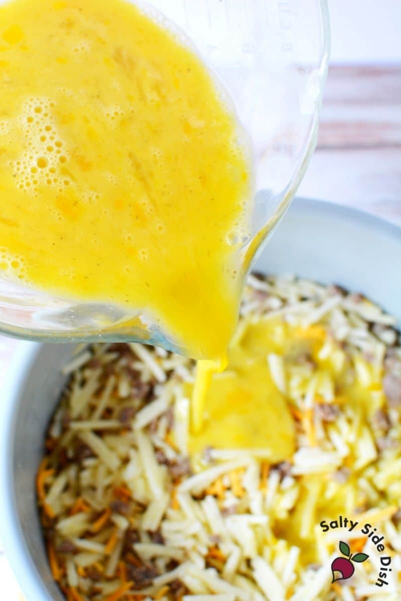 In a separate bowl, whisk eggs, heavy cream and spices together. Pour egg mixture into pot.