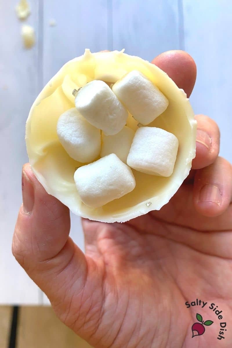 fill marshmallows into white chocolate balls