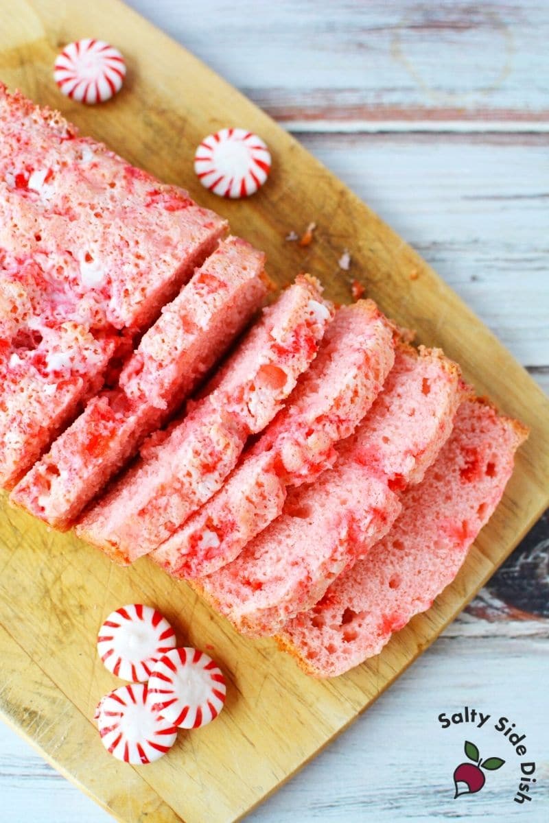 sliced ice cream bread viral tiktok bread idea super fun bread dessert, sitting on a cutting board with peppermints