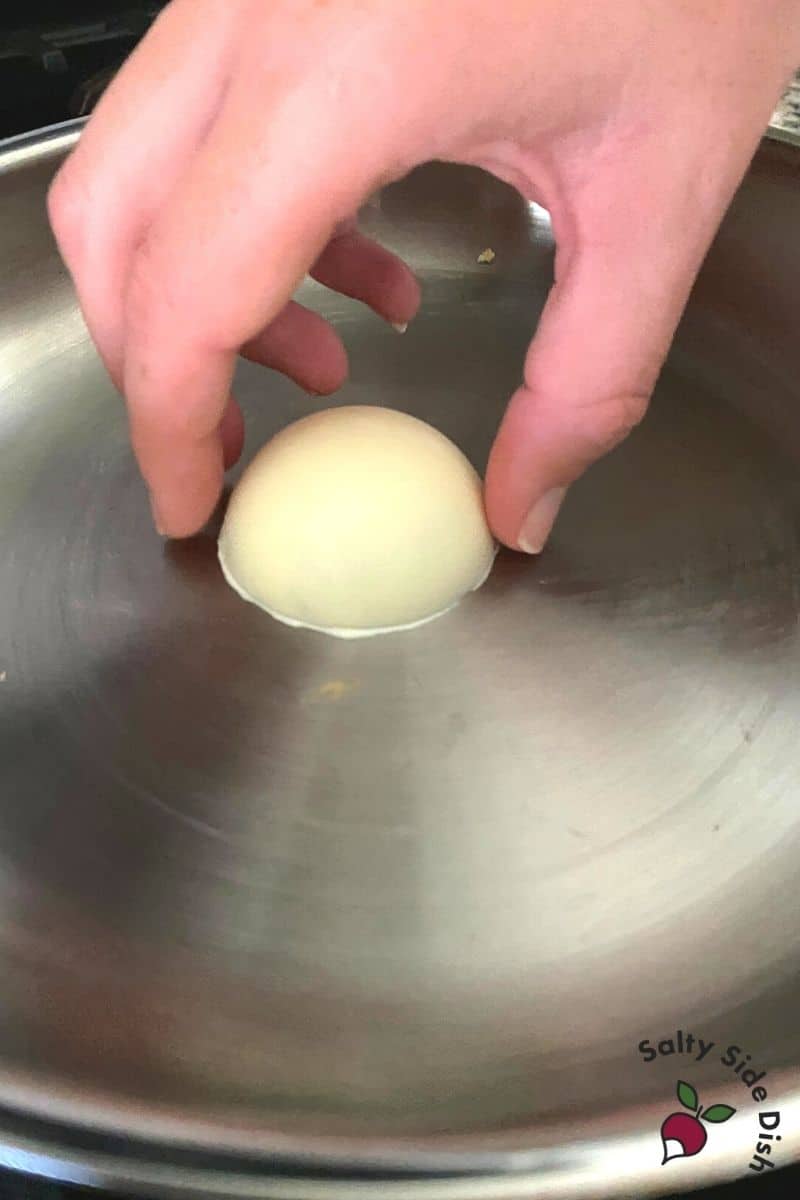 melt seams of white chocolate balls onto silicon pan