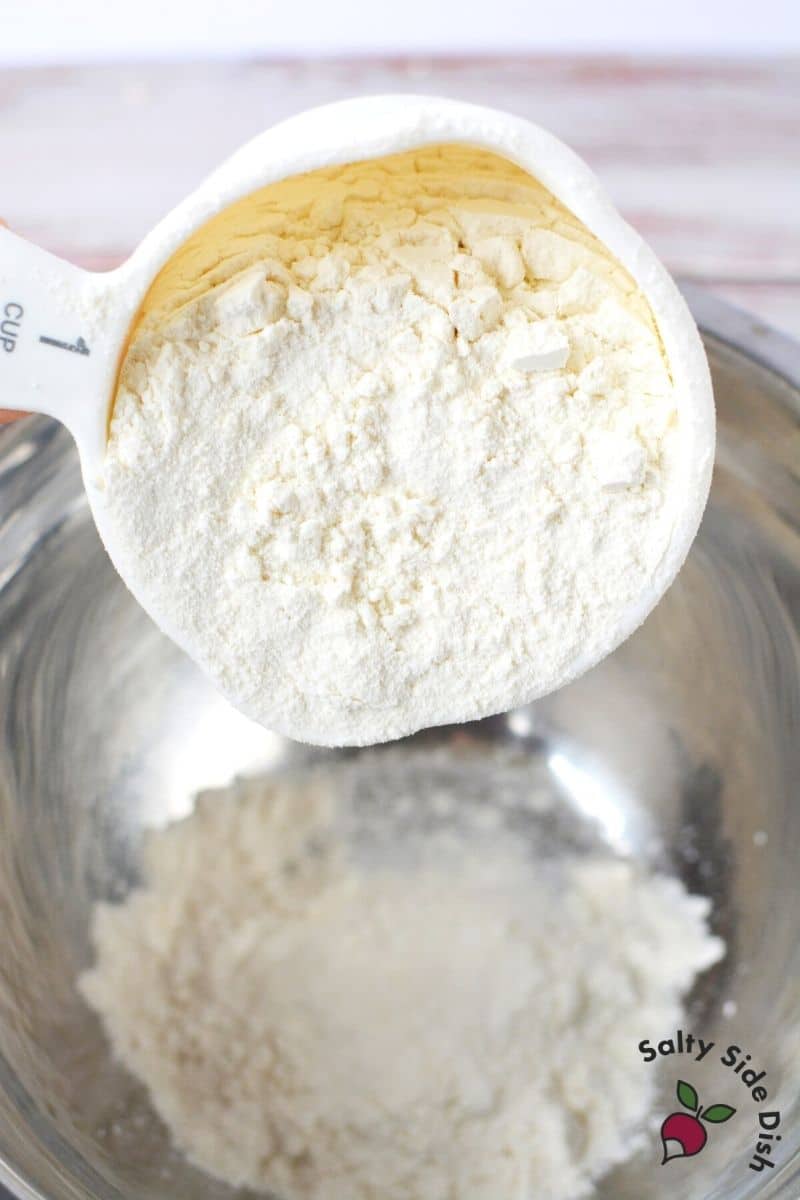 1 cup measuring of flour in a measuring cup