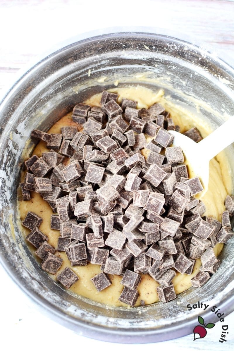 chocolate chunks inside chocolate chip cookie dough.
