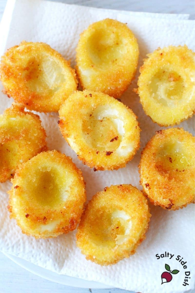 Let fried eggs cool and drain on a paper towel