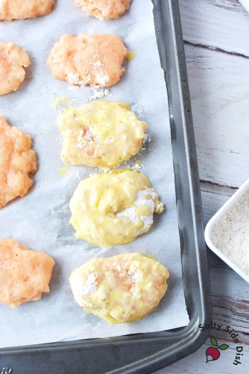 dip frozen nuggets in egg wash and flour