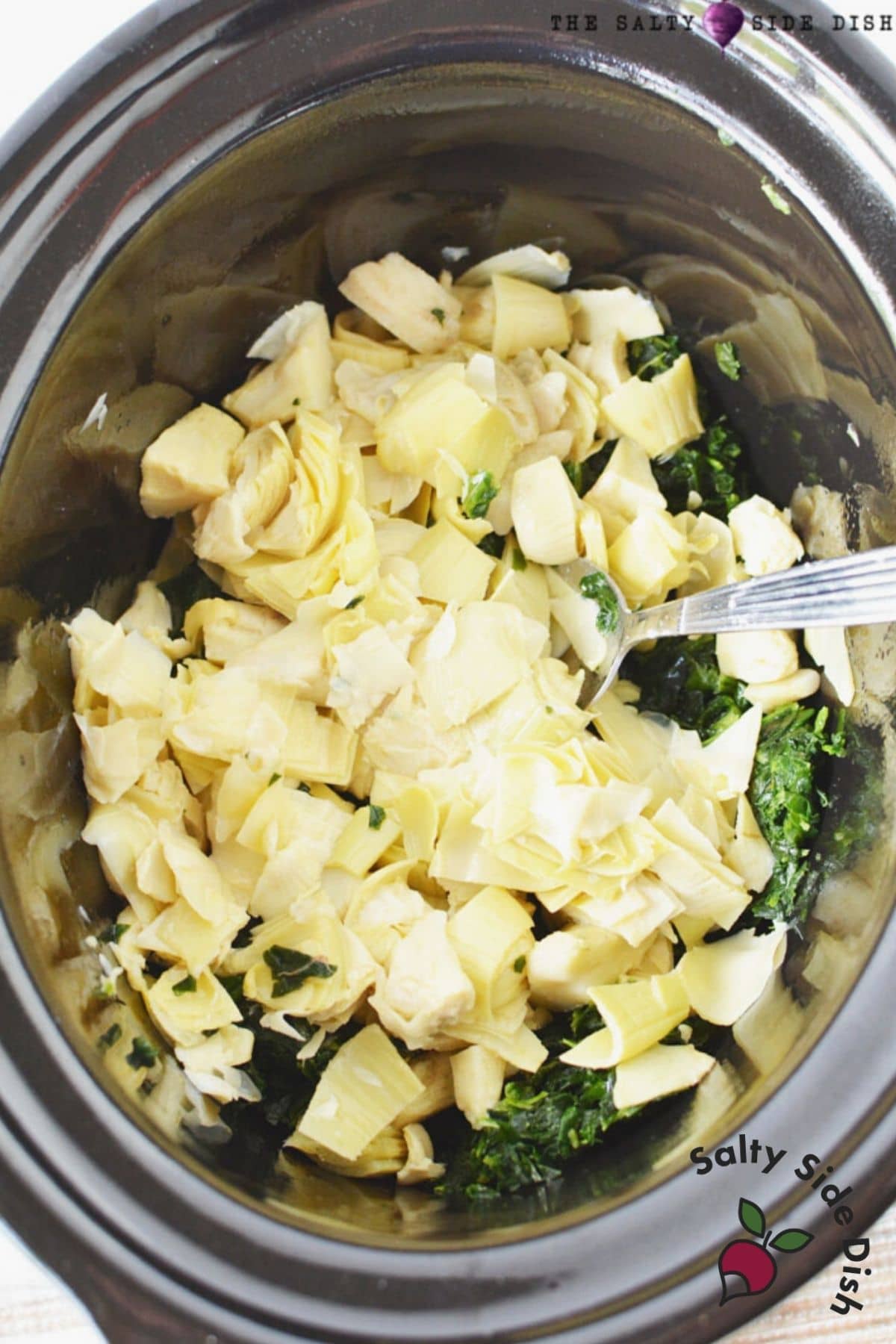 spinach and artichoke dip in a crock pot