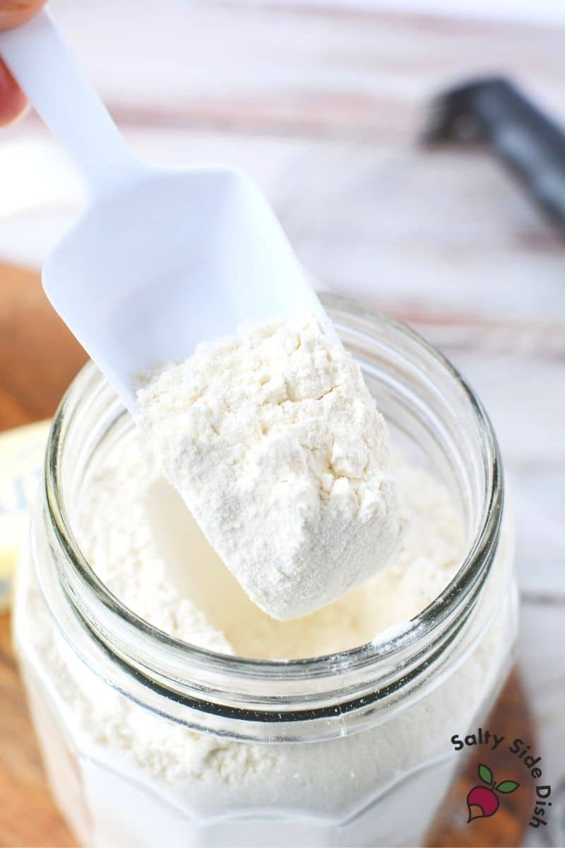 scooping out Bisquick mix