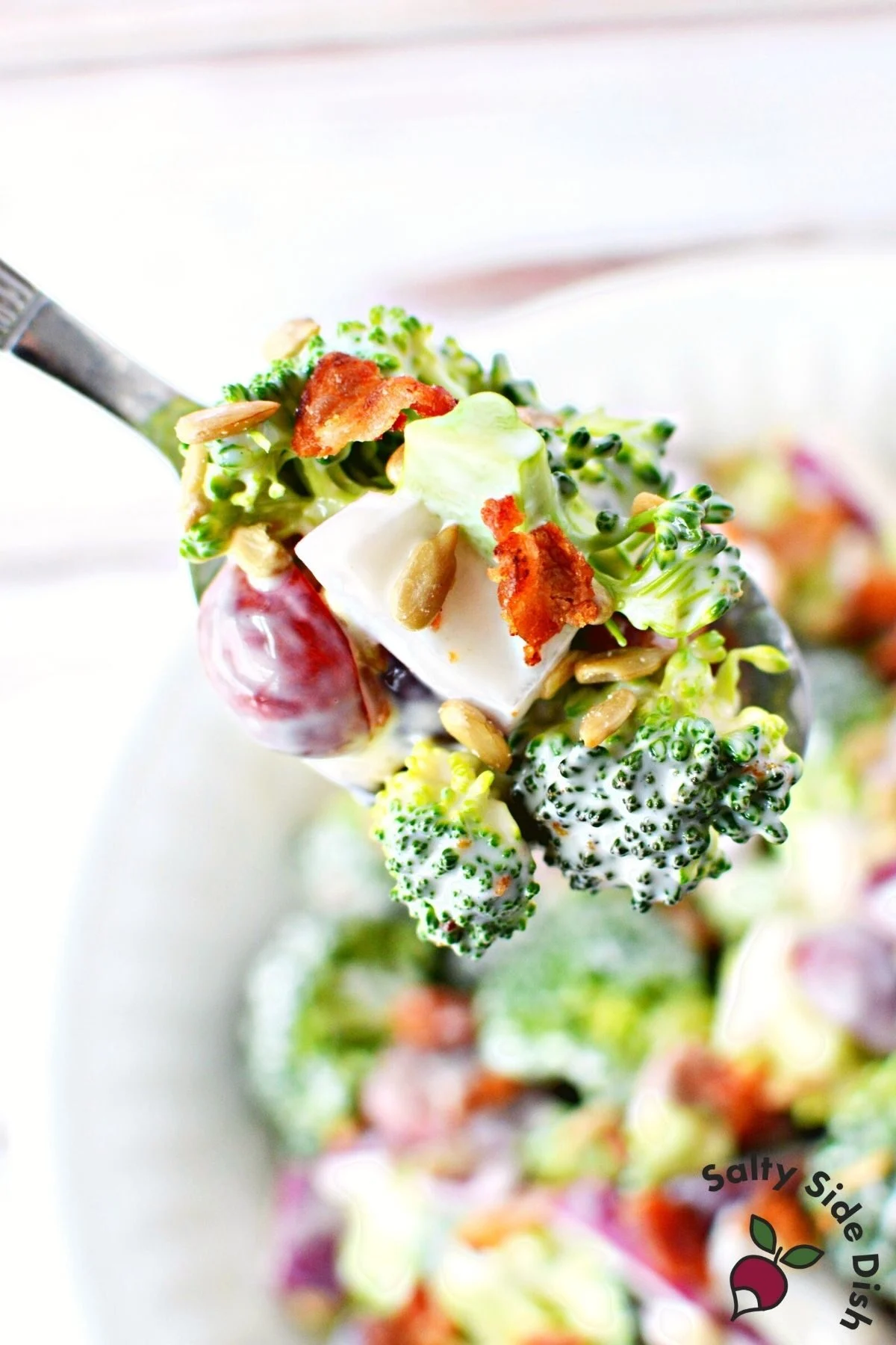 spoonful of potluck broccoli grape salad.
