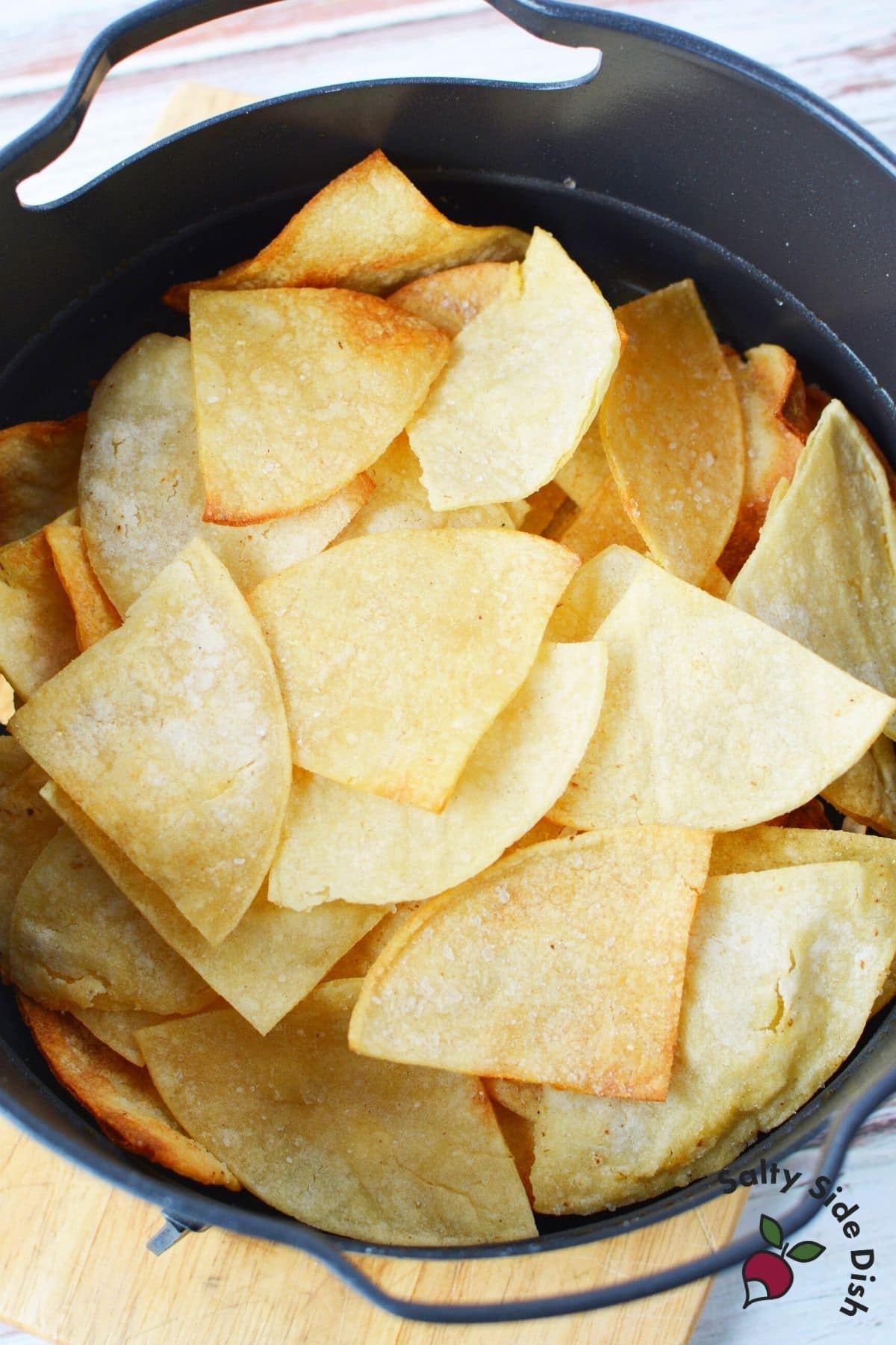 stack of tortilla chips in Ninja Foodi Air Crisp Basket
