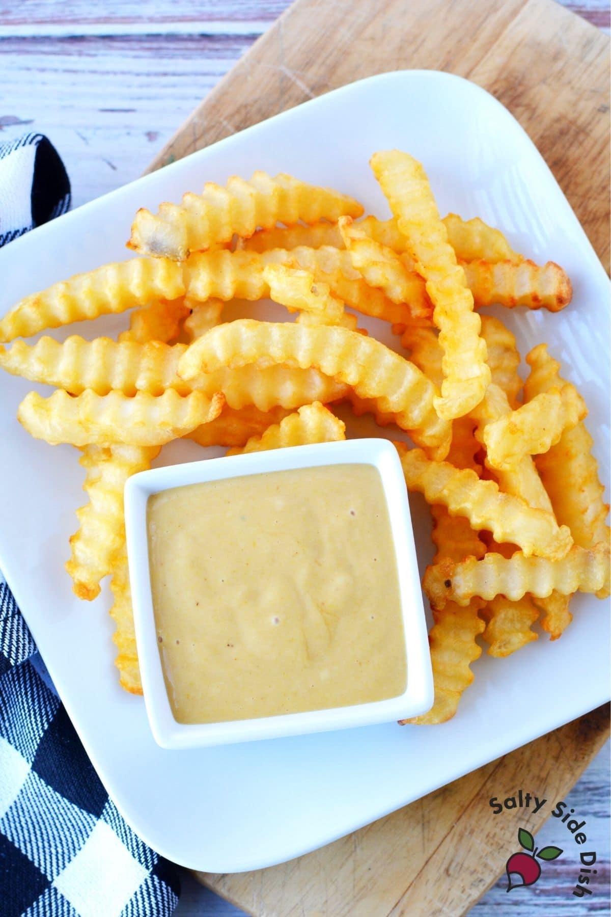 chickfila sauce in a white bowl with a side of fries