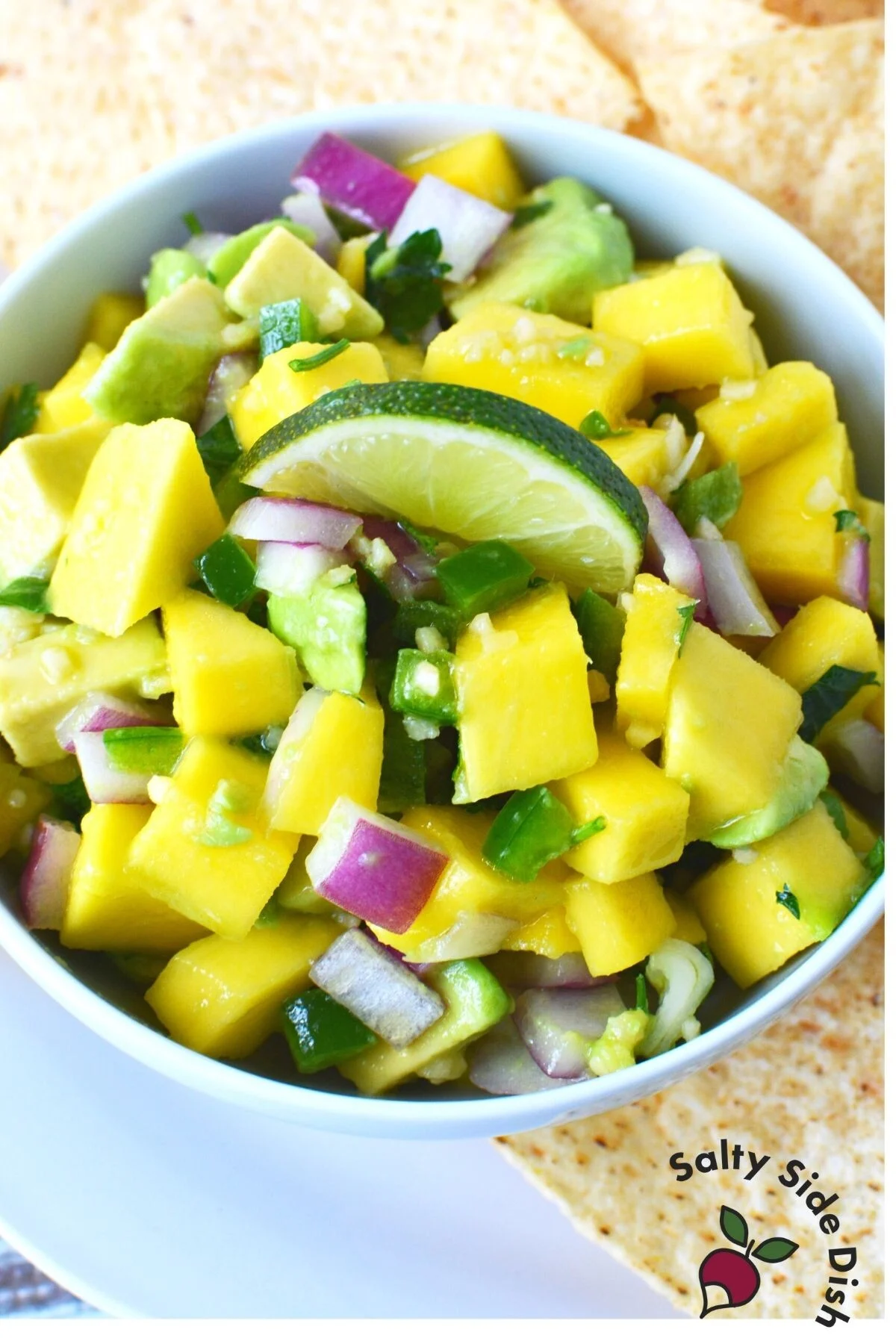 fresh salsa in a white bowl.