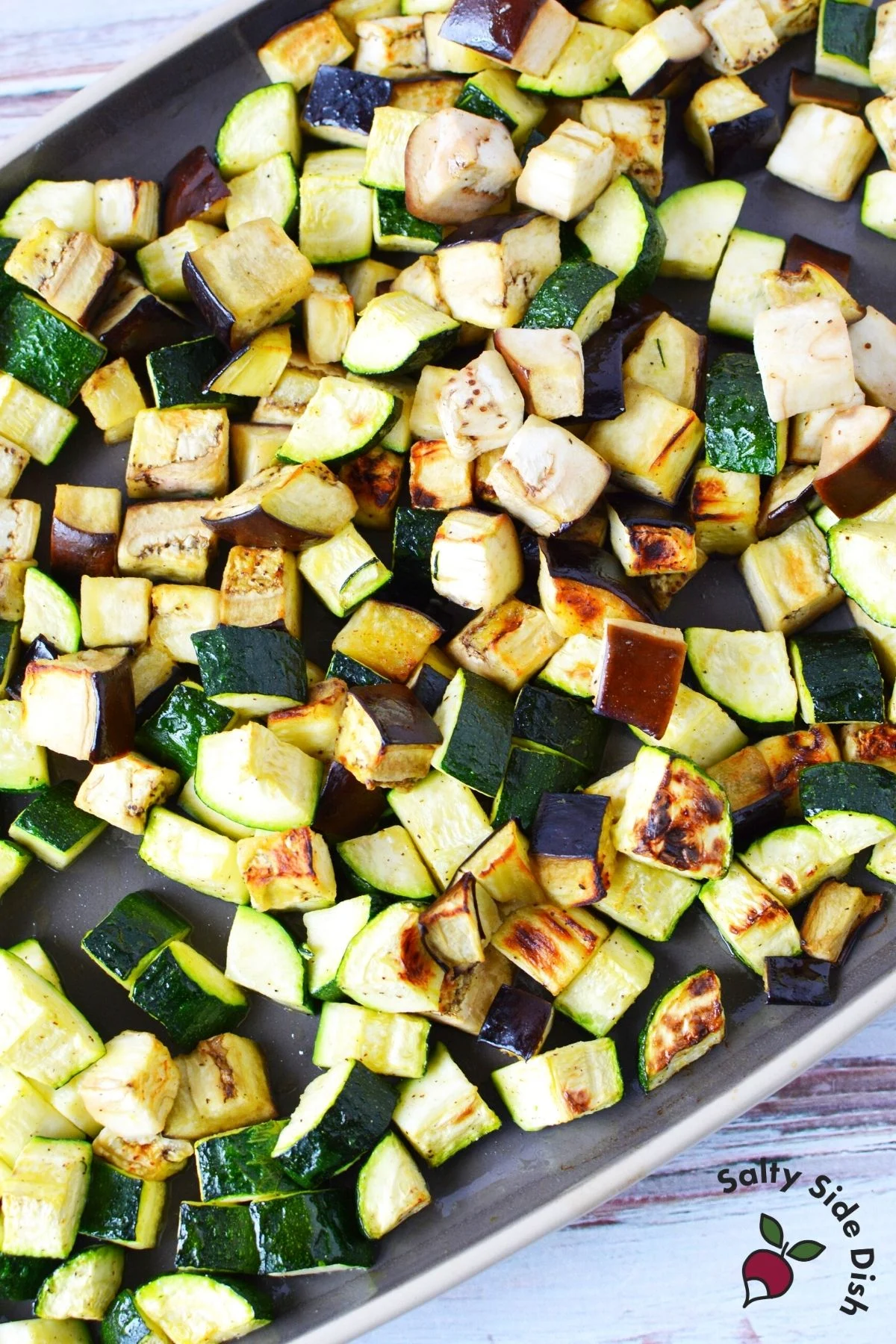 broiled zucchini on a sheet pan