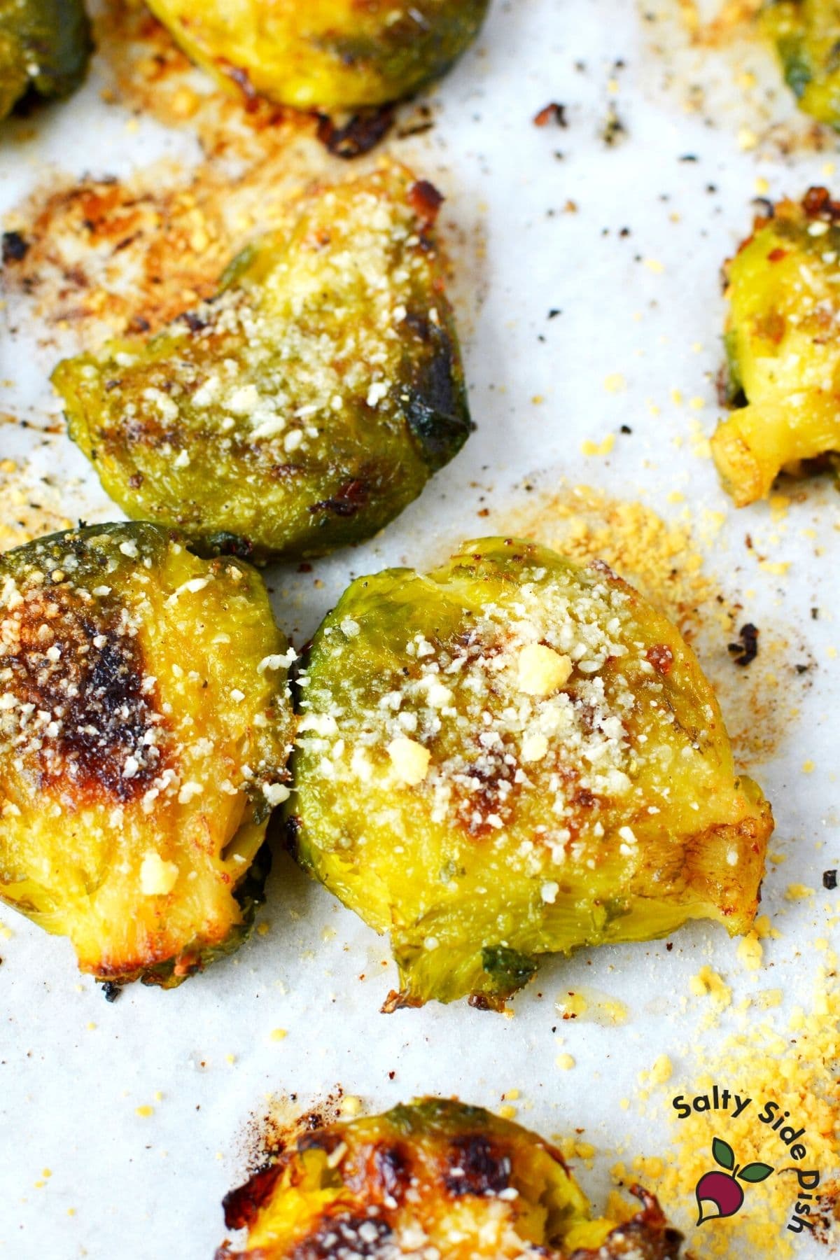 brussels sprouts sitting on parchment paper