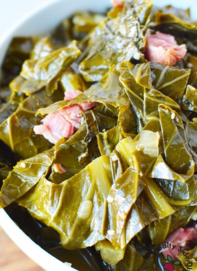 slow cooked collard greens in a bowl with ham