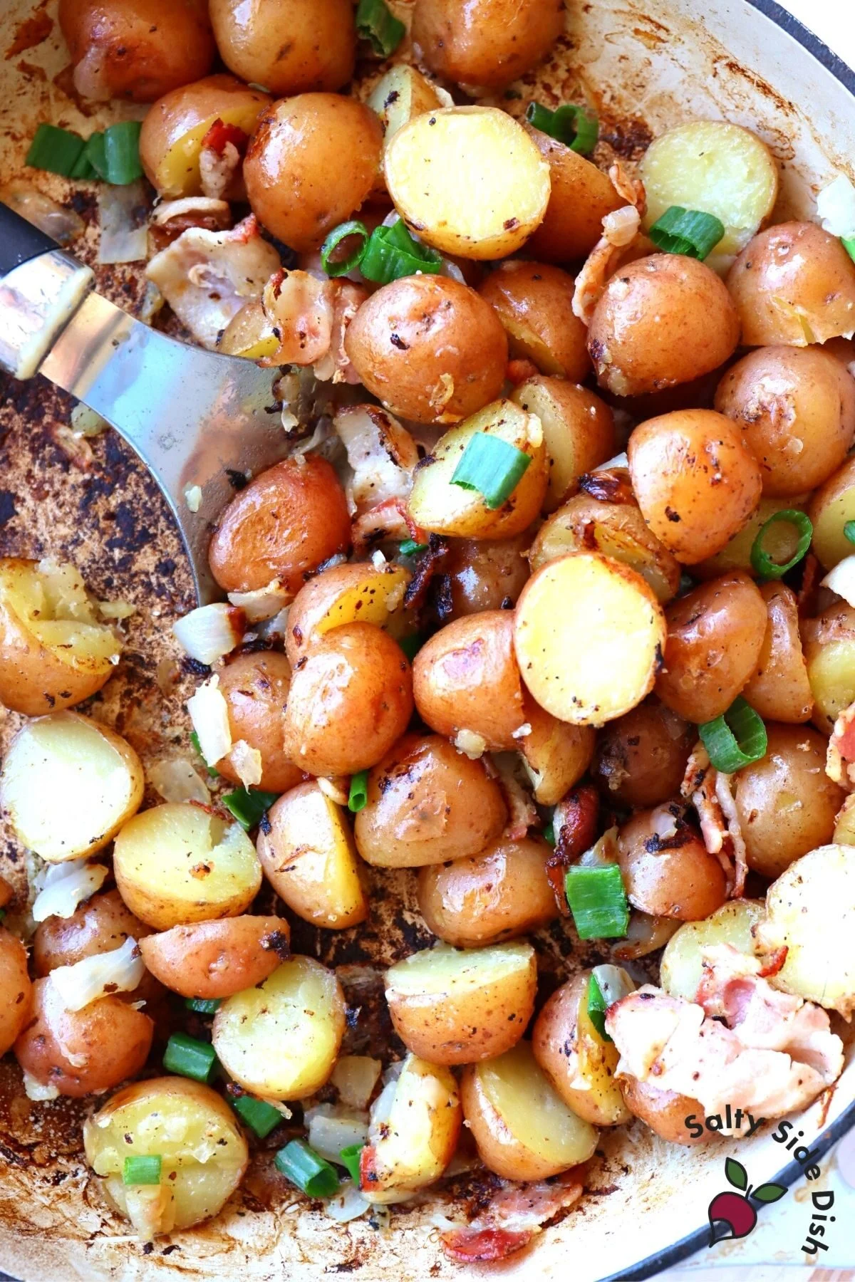 cooked red potatoes in a skillet