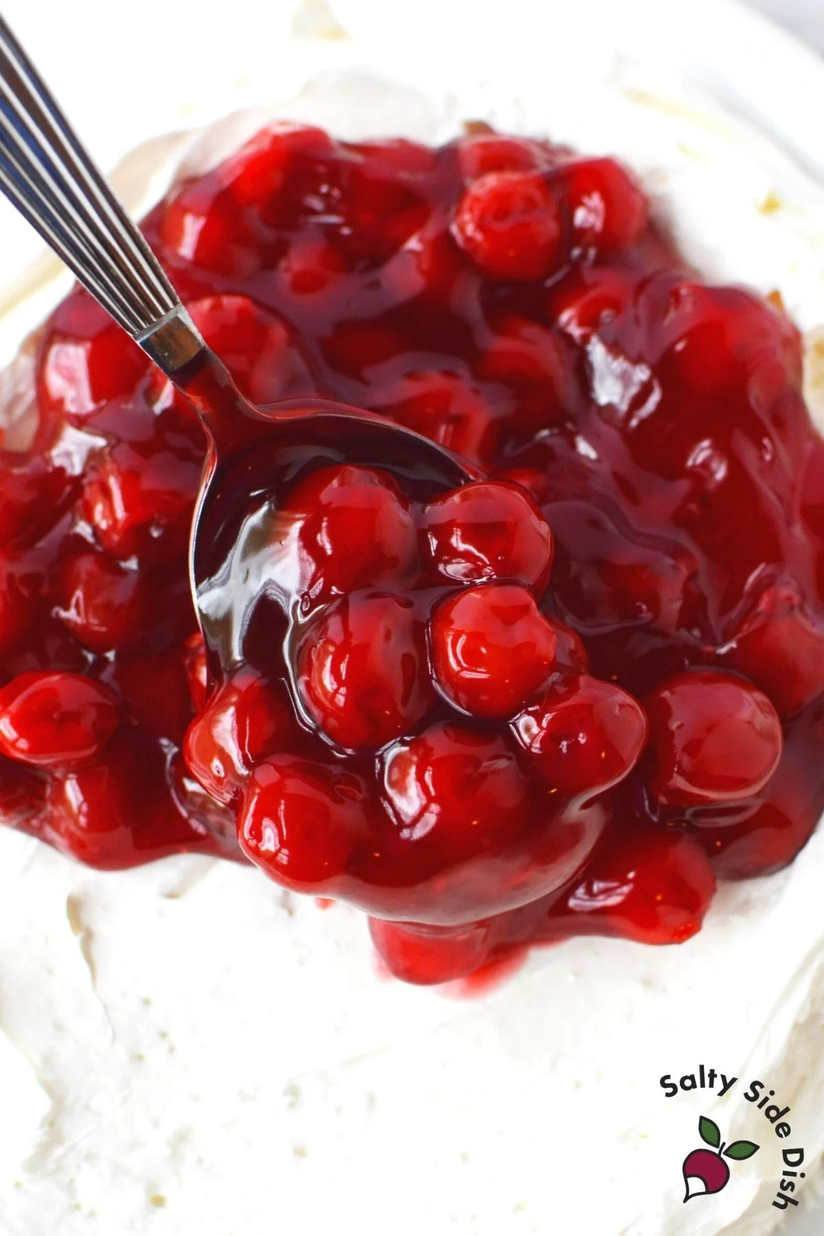 cherry pie filling on a spoon